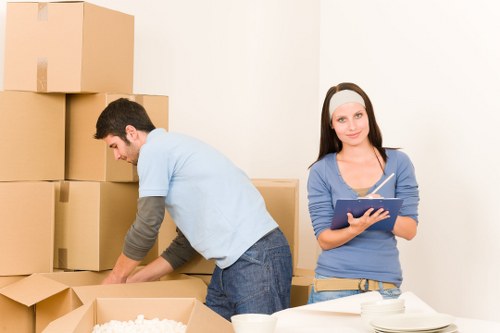 Staff member receiving health and safety guidance in a storage environment