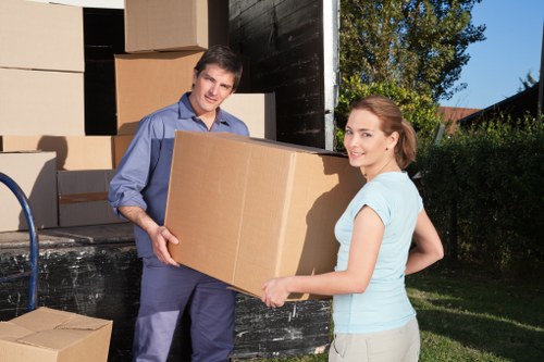 Packed storage boxes and household items arranged safely inside a unit